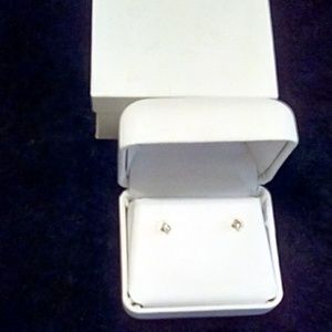 14kt Gold Diamond Stud Earrings.